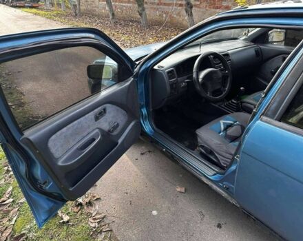 Синій Ніссан Альмера, об'ємом двигуна 1.4 л та пробігом 200 тис. км за 1700 $, фото 9 на Automoto.ua