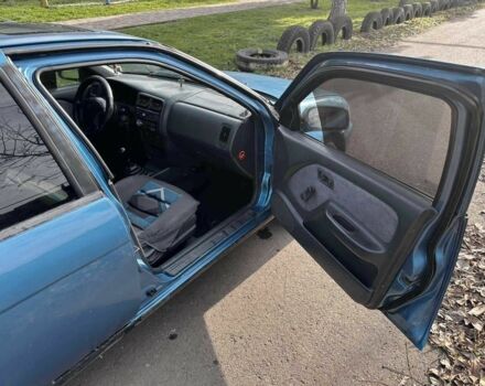 Синій Ніссан Альмера, об'ємом двигуна 1.4 л та пробігом 200 тис. км за 1700 $, фото 11 на Automoto.ua