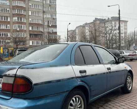 Синий Ниссан Альмера, объемом двигателя 1.4 л и пробегом 155 тыс. км за 1950 $, фото 6 на Automoto.ua