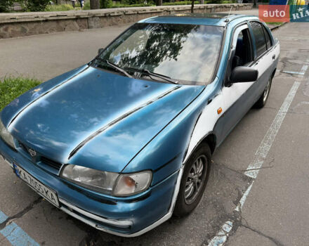 Синий Ниссан Альмера, объемом двигателя 1.4 л и пробегом 150 тыс. км за 2000 $, фото 4 на Automoto.ua
