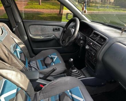 Синій Ніссан Альмера, об'ємом двигуна 1.4 л та пробігом 200 тис. км за 1700 $, фото 10 на Automoto.ua