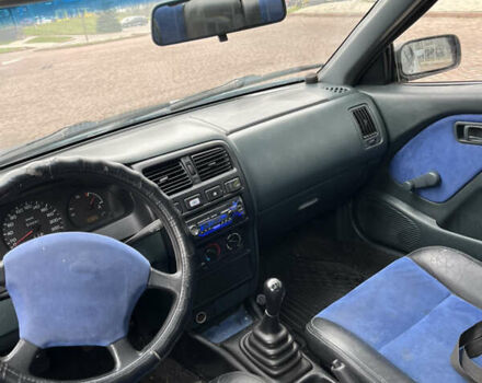 Синий Ниссан Альмера, объемом двигателя 1.4 л и пробегом 155 тыс. км за 1950 $, фото 12 на Automoto.ua