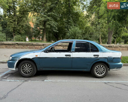 Синий Ниссан Альмера, объемом двигателя 1.4 л и пробегом 150 тыс. км за 2000 $, фото 6 на Automoto.ua