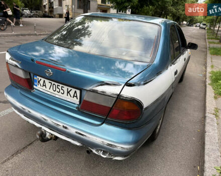 Синий Ниссан Альмера, объемом двигателя 1.4 л и пробегом 150 тыс. км за 2000 $, фото 5 на Automoto.ua