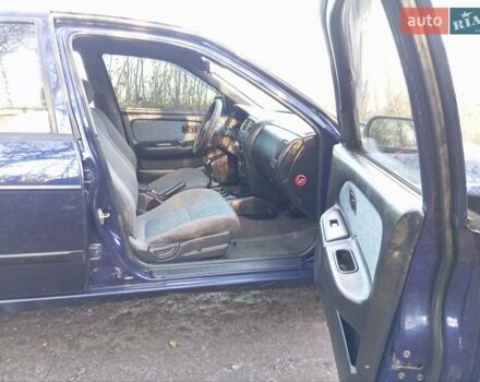 Синий Ниссан Альмера, объемом двигателя 1.4 л и пробегом 263 тыс. км за 1900 $, фото 7 на Automoto.ua