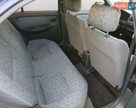 Синій Ніссан Альмера, об'ємом двигуна 1.4 л та пробігом 295 тис. км за 2650 $, фото 2 на Automoto.ua