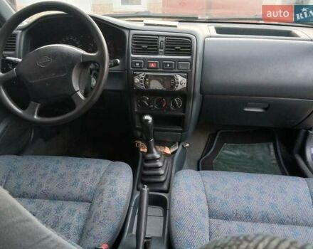 Синій Ніссан Альмера, об'ємом двигуна 1.4 л та пробігом 295 тис. км за 2650 $, фото 5 на Automoto.ua