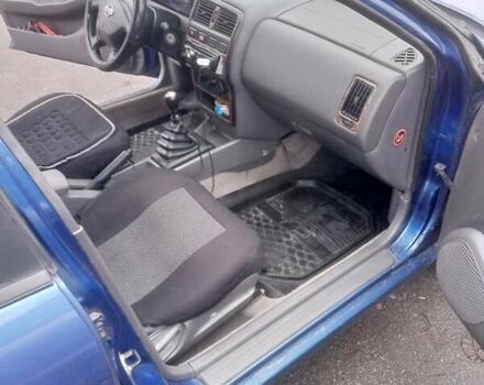 Синій Ніссан Альмера, об'ємом двигуна 1.4 л та пробігом 323 тис. км за 1800 $, фото 5 на Automoto.ua