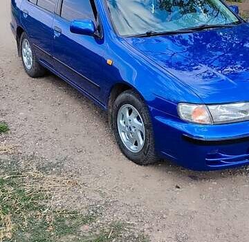 Синій Ніссан Альмера, об'ємом двигуна 1.6 л та пробігом 237 тис. км за 3500 $, фото 15 на Automoto.ua