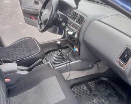 Синій Ніссан Альмера, об'ємом двигуна 1.4 л та пробігом 323 тис. км за 1800 $, фото 7 на Automoto.ua