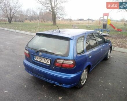 Синій Ніссан Альмера, об'ємом двигуна 1.4 л та пробігом 323 тис. км за 1800 $, фото 3 на Automoto.ua