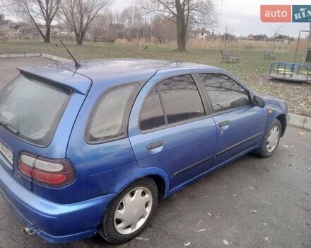 Синій Ніссан Альмера, об'ємом двигуна 1.4 л та пробігом 323 тис. км за 1800 $, фото 4 на Automoto.ua
