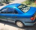 Синий Ниссан Альмера, объемом двигателя 1.5 л и пробегом 320 тыс. км за 2400 $, фото 6 на Automoto.ua