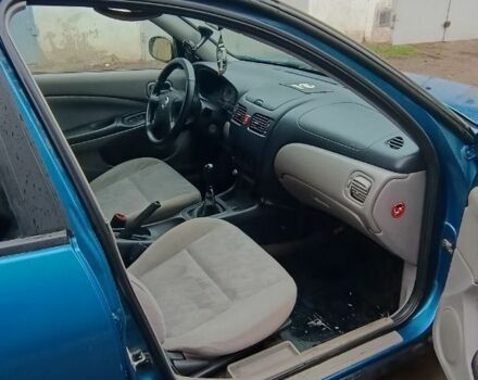 Синій Ніссан Альмера, об'ємом двигуна 1.5 л та пробігом 300 тис. км за 2899 $, фото 10 на Automoto.ua