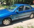Синий Ниссан Альмера, объемом двигателя 1.5 л и пробегом 320 тыс. км за 2400 $, фото 5 на Automoto.ua