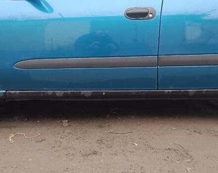 Синій Ніссан Альмера, об'ємом двигуна 1.5 л та пробігом 300 тис. км за 2900 $, фото 7 на Automoto.ua