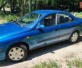 Синий Ниссан Альмера, объемом двигателя 1.5 л и пробегом 320 тыс. км за 2400 $, фото 4 на Automoto.ua