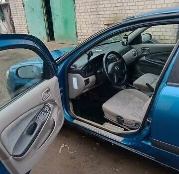 Синій Ніссан Альмера, об'ємом двигуна 1.5 л та пробігом 300 тис. км за 2900 $, фото 5 на Automoto.ua