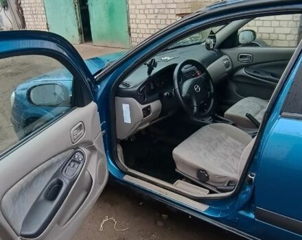 Синій Ніссан Альмера, об'ємом двигуна 1.5 л та пробігом 300 тис. км за 2899 $, фото 13 на Automoto.ua