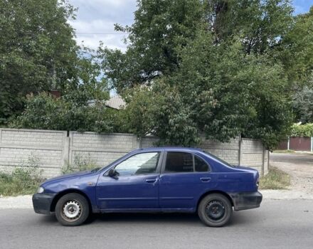 Синий Ниссан Альмера, объемом двигателя 2 л и пробегом 333 тыс. км за 800 $, фото 1 на Automoto.ua