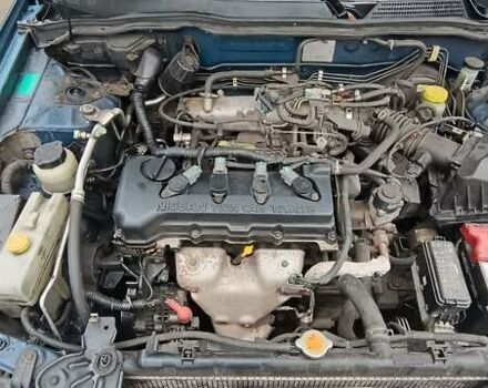Синій Ніссан Альмера, об'ємом двигуна 1.5 л та пробігом 300 тис. км за 2900 $, фото 12 на Automoto.ua