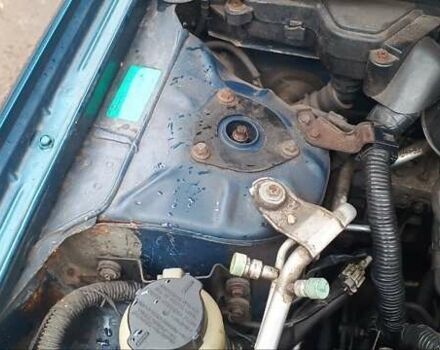 Синій Ніссан Альмера, об'ємом двигуна 1.5 л та пробігом 300 тис. км за 2900 $, фото 13 на Automoto.ua