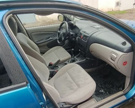 Синій Ніссан Альмера, об'ємом двигуна 1.5 л та пробігом 300 тис. км за 2899 $, фото 6 на Automoto.ua