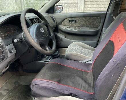 Синий Ниссан Альмера, объемом двигателя 2 л и пробегом 333 тыс. км за 800 $, фото 3 на Automoto.ua