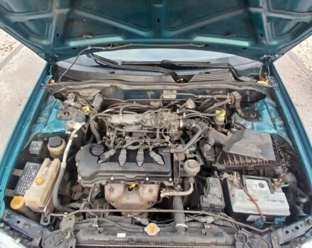 Синий Ниссан Альмера, объемом двигателя 1.6 л и пробегом 241 тыс. км за 3000 $, фото 7 на Automoto.ua