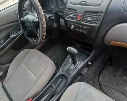 Синій Ніссан Альмера, об'ємом двигуна 1.6 л та пробігом 241 тис. км за 3000 $, фото 8 на Automoto.ua
