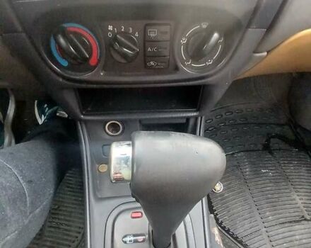 Синій Ніссан Альмера, об'ємом двигуна 1.6 л та пробігом 241 тис. км за 3000 $, фото 12 на Automoto.ua