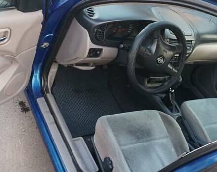 Синий Ниссан Альмера, объемом двигателя 1.5 л и пробегом 200 тыс. км за 2500 $, фото 4 на Automoto.ua