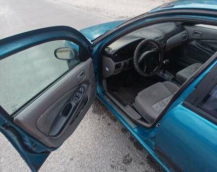 Синій Ніссан Альмера, об'ємом двигуна 1.6 л та пробігом 241 тис. км за 3000 $, фото 3 на Automoto.ua