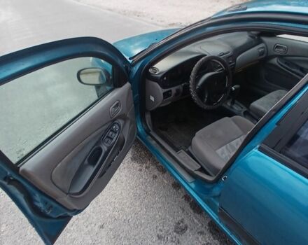 Синий Ниссан Альмера, объемом двигателя 1.6 л и пробегом 241 тыс. км за 3000 $, фото 6 на Automoto.ua