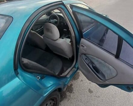 Синій Ніссан Альмера, об'ємом двигуна 1.6 л та пробігом 241 тис. км за 3000 $, фото 2 на Automoto.ua