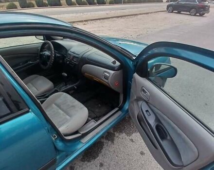 Синій Ніссан Альмера, об'ємом двигуна 1.6 л та пробігом 241 тис. км за 3000 $, фото 7 на Automoto.ua