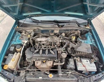 Синій Ніссан Альмера, об'ємом двигуна 1.6 л та пробігом 241 тис. км за 3000 $, фото 10 на Automoto.ua