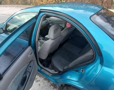 Синий Ниссан Альмера, объемом двигателя 1.6 л и пробегом 241 тыс. км за 3000 $, фото 5 на Automoto.ua