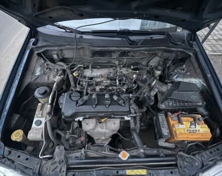 Синий Ниссан Альмера, объемом двигателя 1.5 л и пробегом 400 тыс. км за 2600 $, фото 7 на Automoto.ua