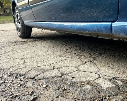 Синій Ніссан Альмера, об'ємом двигуна 1 л та пробігом 124 тис. км за 4250 $, фото 4 на Automoto.ua