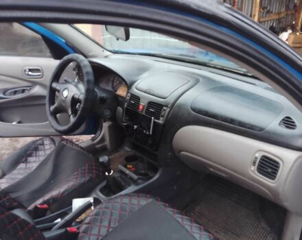 Синій Ніссан Альмера, об'ємом двигуна 1.4 л та пробігом 158 тис. км за 3500 $, фото 9 на Automoto.ua