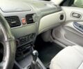Синій Ніссан Альмера, об'ємом двигуна 1 л та пробігом 124 тис. км за 4250 $, фото 13 на Automoto.ua