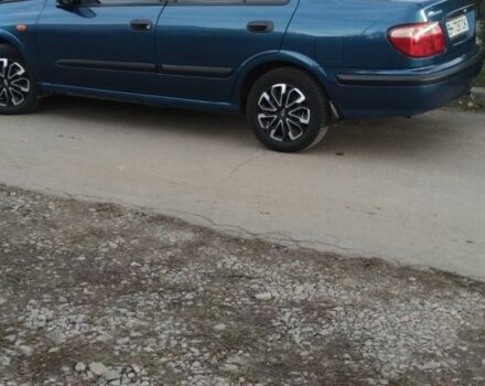 Синій Ніссан Альмера, об'ємом двигуна 1 л та пробігом 124 тис. км за 4250 $, фото 1 на Automoto.ua