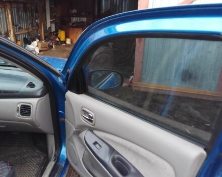 Синій Ніссан Альмера, об'ємом двигуна 1.4 л та пробігом 158 тис. км за 3500 $, фото 8 на Automoto.ua