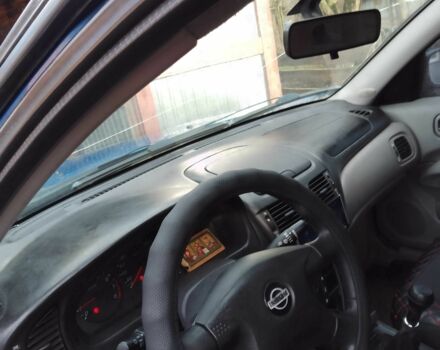 Синій Ніссан Альмера, об'ємом двигуна 1.4 л та пробігом 158 тис. км за 3500 $, фото 6 на Automoto.ua