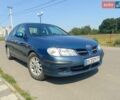 Синій Ніссан Альмера, об'ємом двигуна 1.5 л та пробігом 320 тис. км за 2000 $, фото 1 на Automoto.ua