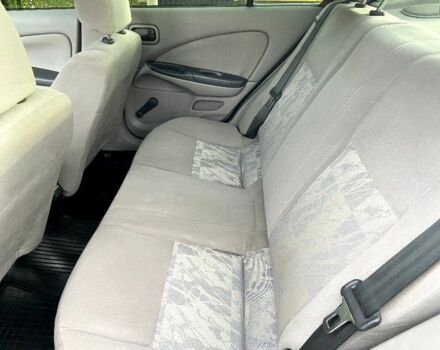 Синій Ніссан Альмера, об'ємом двигуна 1 л та пробігом 124 тис. км за 4250 $, фото 18 на Automoto.ua