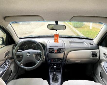Синій Ніссан Альмера, об'ємом двигуна 1 л та пробігом 124 тис. км за 4250 $, фото 6 на Automoto.ua