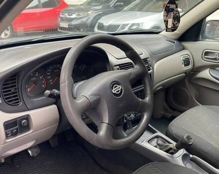 Синий Ниссан Альмера, объемом двигателя 1.5 л и пробегом 217 тыс. км за 2299 $, фото 5 на Automoto.ua