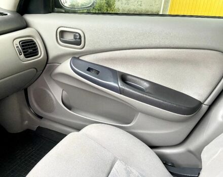 Синій Ніссан Альмера, об'ємом двигуна 1 л та пробігом 124 тис. км за 4250 $, фото 12 на Automoto.ua